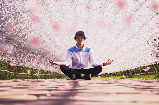 a man doing lotus yoga pose