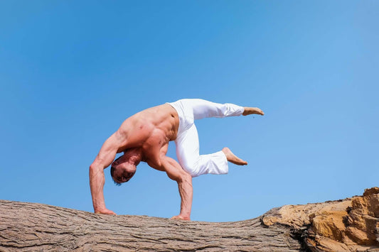 a man showing muscles by doing yoga