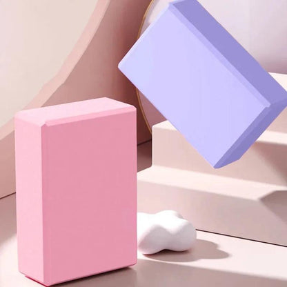 pink and purple yoga blocks